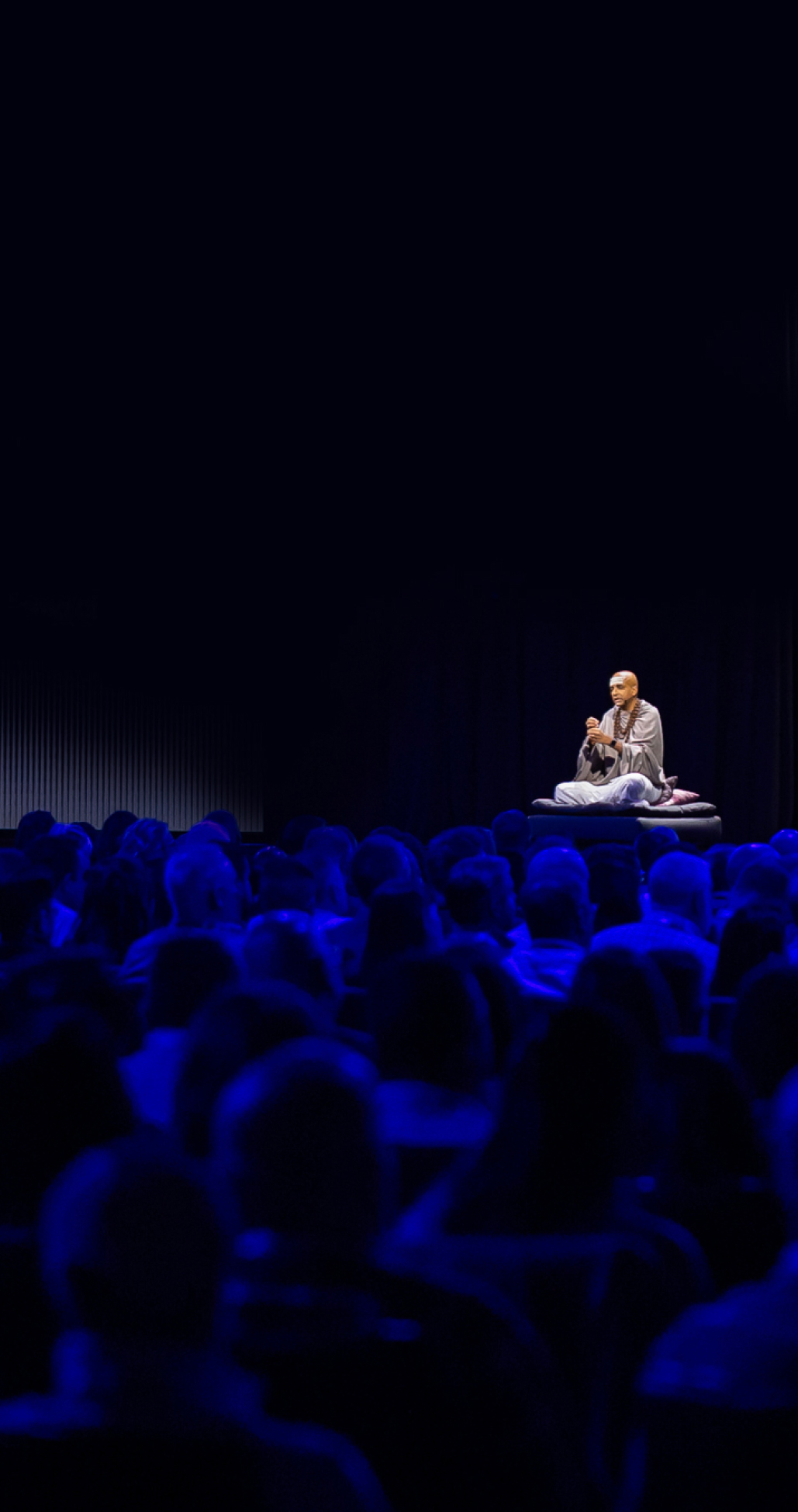 Dandapani is speaking in front of a conference