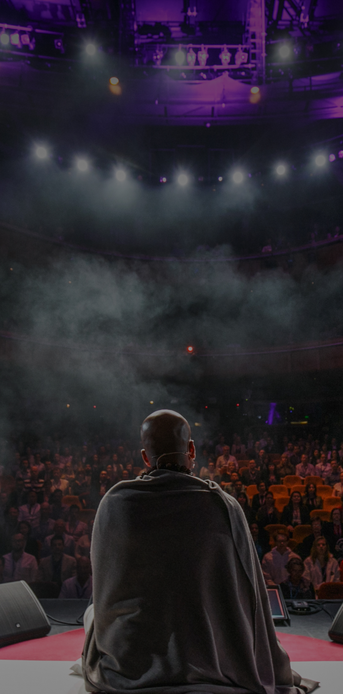 Picture of Dandapani talking to a group of people