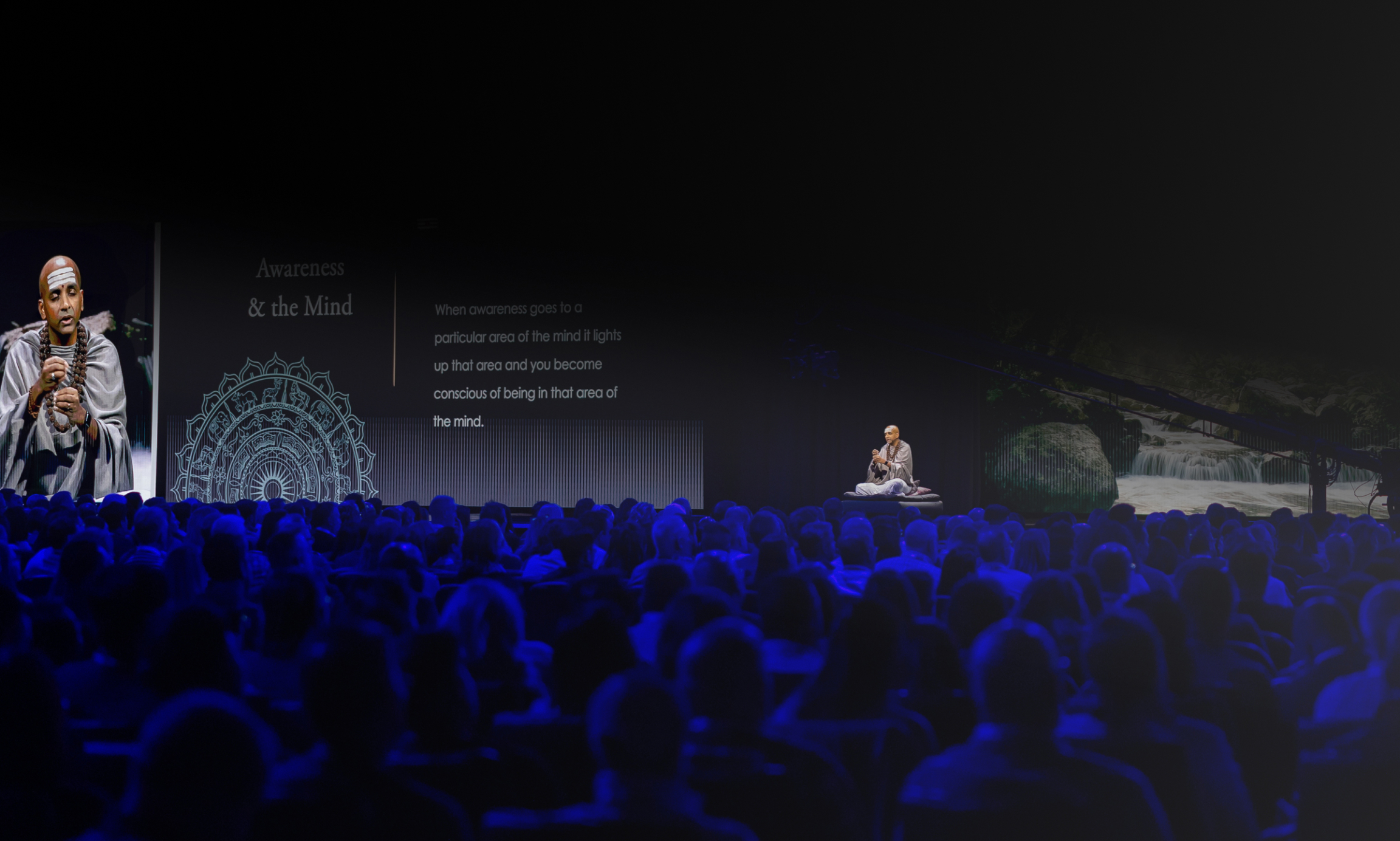 Dandapani is speaking in front of a conference